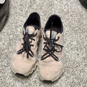On Running Light Pink Sneakers with Black Accents